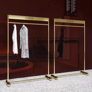 Высококачественная витрина нового стиля из нержавеющей стали и золотистого металла для магазина женской одежды